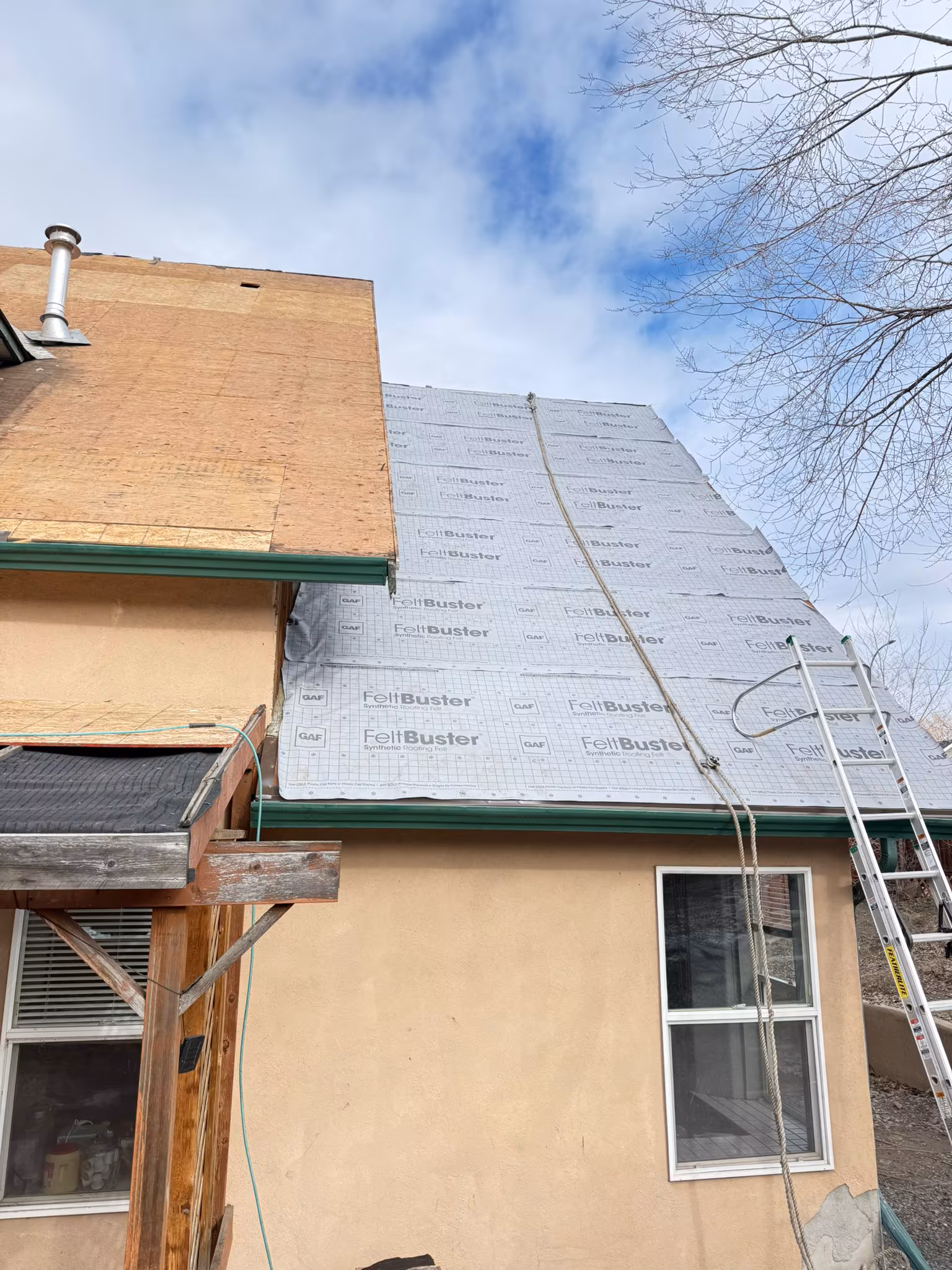 Complete roof tear-off and replacement project with ice and water shield — Kelowna area