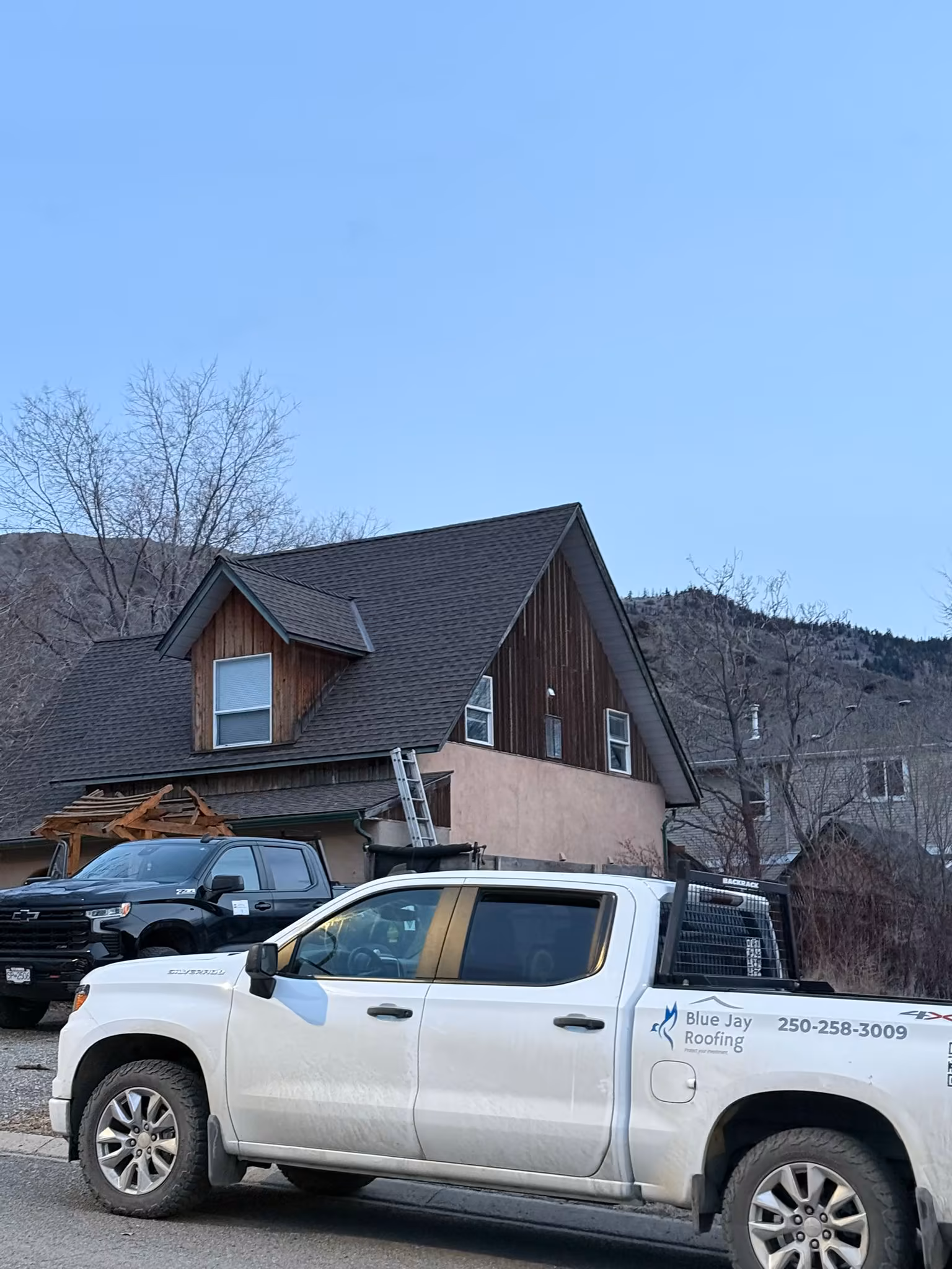 Completed roof replacement with proper ventilation system and drip edge — Kelowna, BC