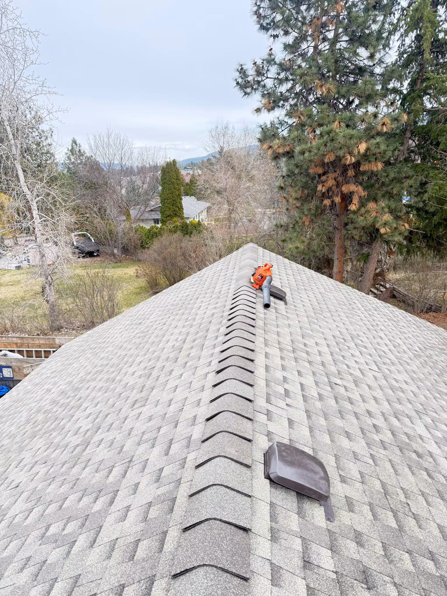 Residential roofing project showing excellent nailing pattern and course alignment — West Kelowna