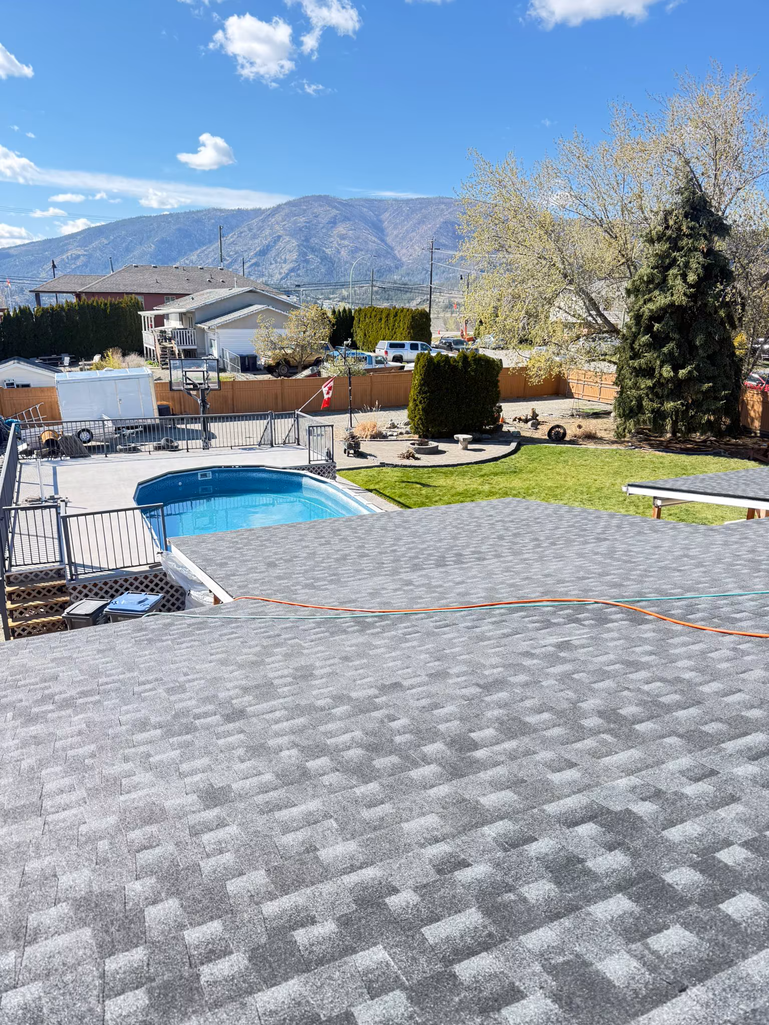 Full roof replacement showing ice and water shield application before shingle install — Kelowna