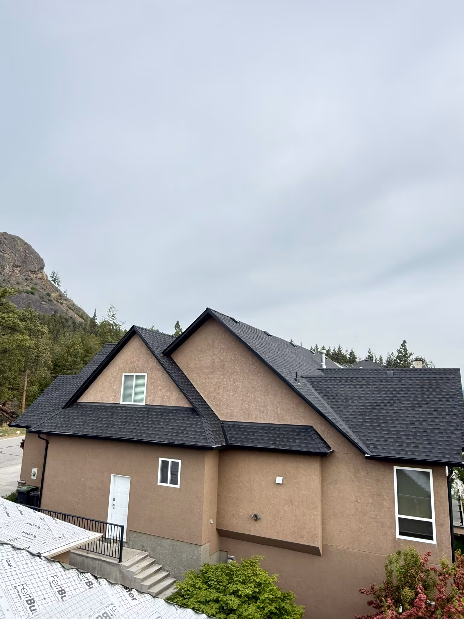 Blue Jay Roofing professional installation team on Okanagan residential project