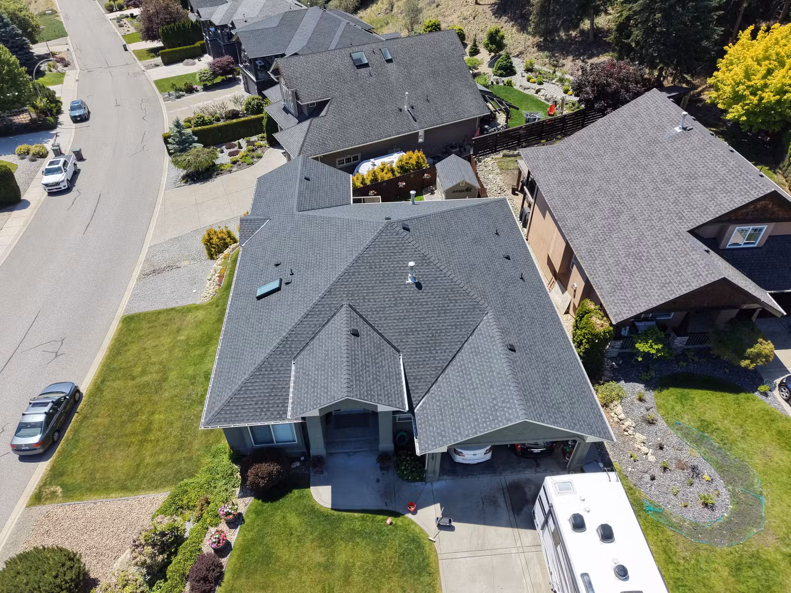Overhead view of a multi-section architectural shingle roof in Lakeview Heights